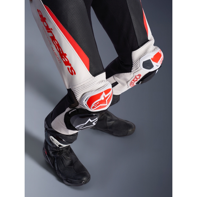 Дамски едноделен кожен мотоциклетен костюм Alpinestars Stella GP-R7 бяло-флуоресцентно червено-черно